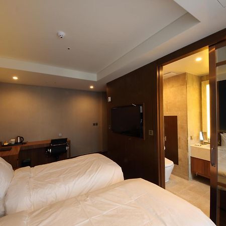 Benikea The H Hotel Hwaseong Værelse billede