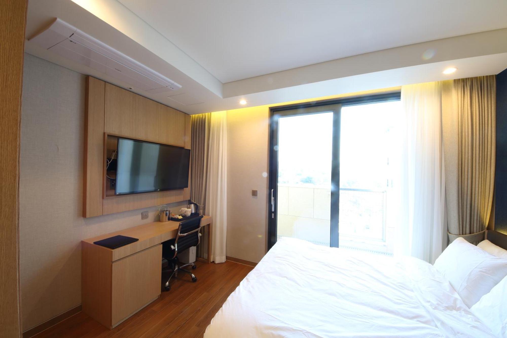 Benikea The H Hotel Hwaseong Værelse billede